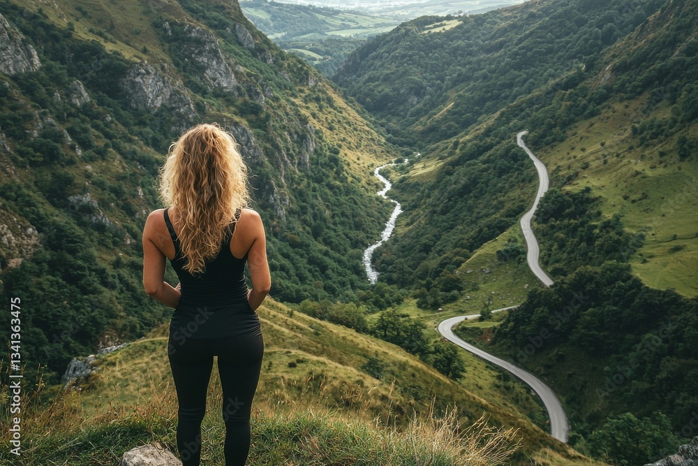 Naklejka premium In the Kabardino-Balkaria Republic, a blonde girl takes in the view of a beautiful gorge