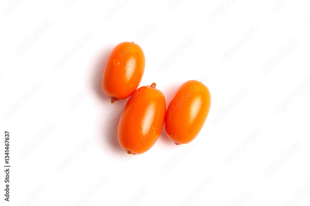 A close-up of three bright orange sea buckthorn berries with a smooth, glossy surface, isolated on a white background. Rich in antioxidants and used in health foods A close-up of three bright orange sea buckthorn berries with a smooth, glossy surface, isolated on a white background. Rich in antioxidants and used in health foods