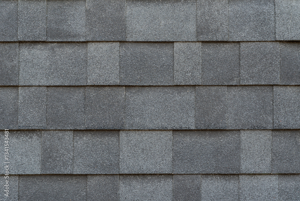 Fototapeta premium Overlapping sheet of soft gray asphalt shingles