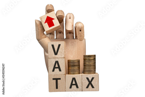 Obraz na płótnie sztuczna dłoń układająca napisy dotyczące finansów: VAT, TAX, w salonie