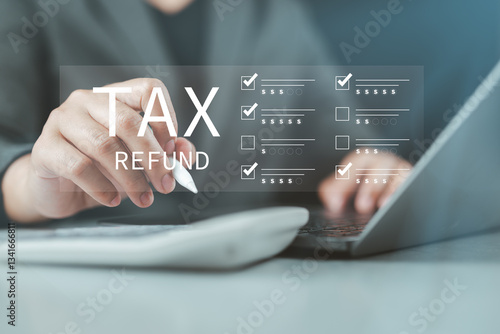 Fotografie Businessman detailed tax planning and refund checklist strategic preparation for