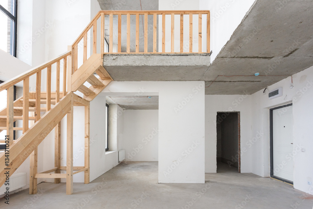 Obraz premium interior of the apartment without decoration in gray colors. rough finish