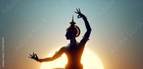Silhouette of a classical dancer performing a dance pose
