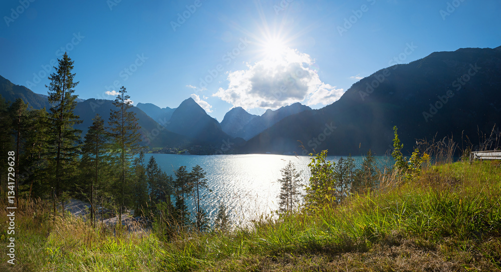 view from lakeside road to lake Achensee and tirolean alps