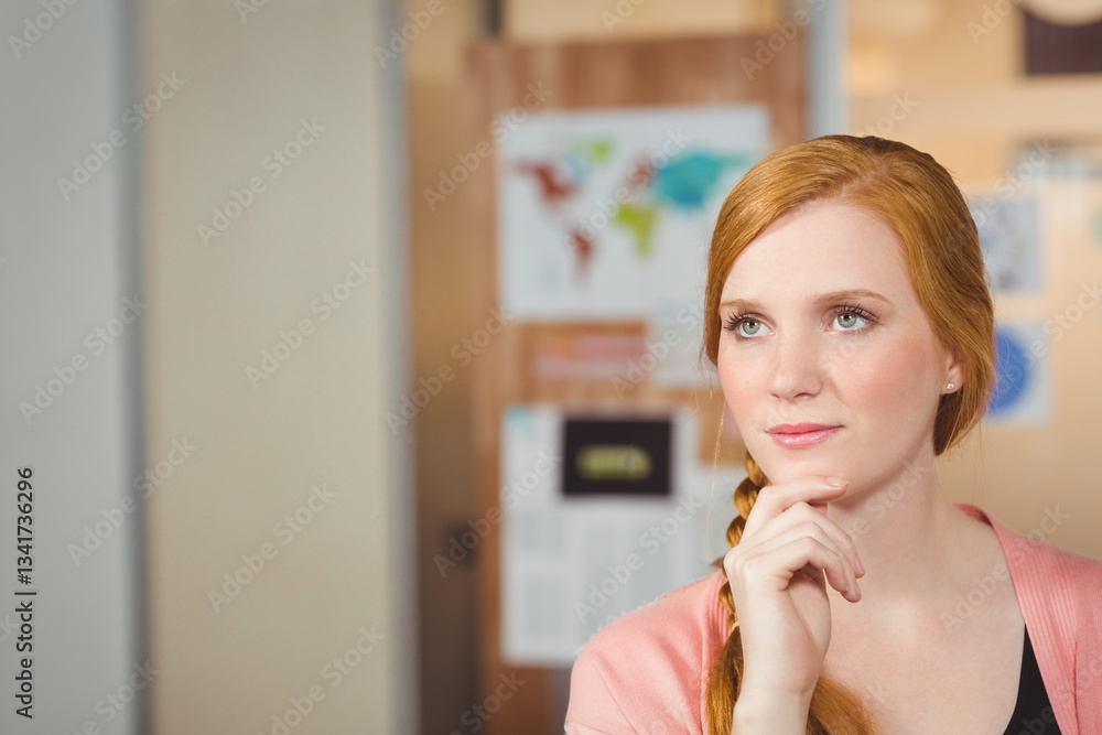 Thoughtful woman in office with hand on chin, planning creative ideas, copy space Thoughtful woman in office with hand on chin, planning creative ideas, copy space