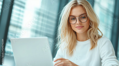 young woman with blonde hair and glasses is focused her laptop, exuding sense of concentration and engagement modern workspace Free Download young woman with blonde hair and glasses is focused her laptop, exuding sense of concentration and engagement modern workspace - GFXLoad