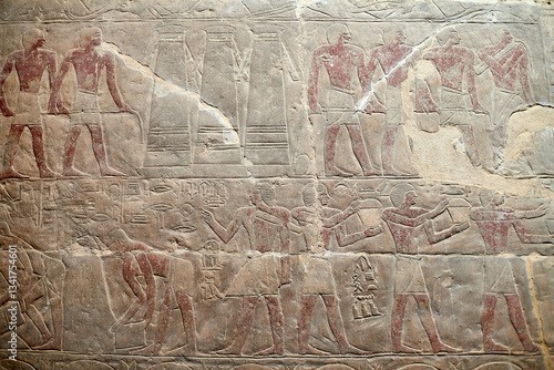 An offering procession from the tomb of Mereruka and grain silo: A colourful wall carving from the mastaba of Mereruka in Saqqara showing men carrying offerings	
