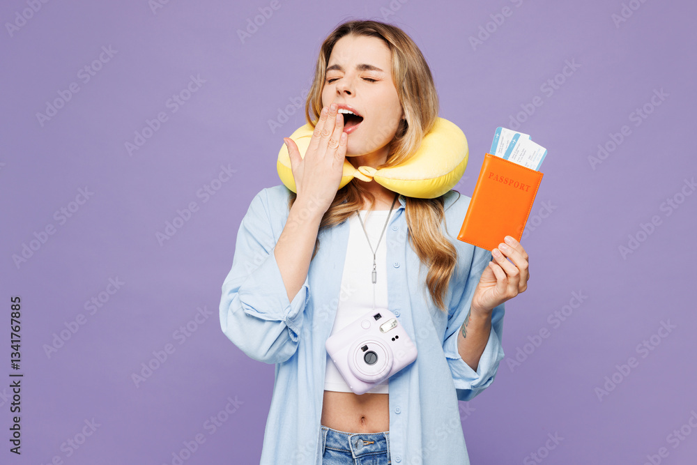 Traveler sleepy woman wears blue clothes hold passport ticket neck pillow isolated on plain purple background. Tourist travel abroad in free spare time rest getaway. Air flight trip journey concept. Traveler sleepy woman wears blue clothes hold passport ticket neck pillow isolated on plain purple background. Tourist travel abroad in free spare time rest getaway. Air flight trip journey concept.
