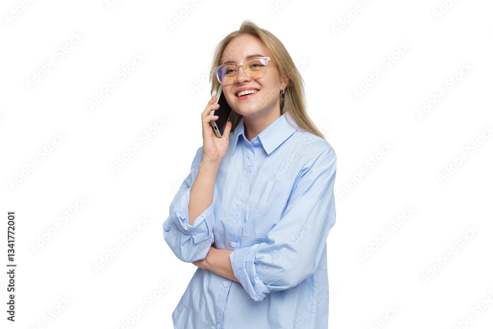 Young woman with glasses smiles while talking on the phone in a bright setting indoors Young woman with glasses smiles while talking on the phone in a bright setting indoors