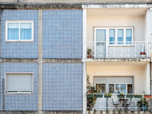Close-up of traditional ceramic tile covered facades of residential apartment buildings in Braga in Portugal