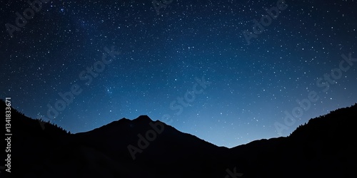 Stunning night landscape featuring the bright Milky Way galaxy over majestic mountains. A breathtaking starry sky perfect for nature, astronomy, and adventure themes.