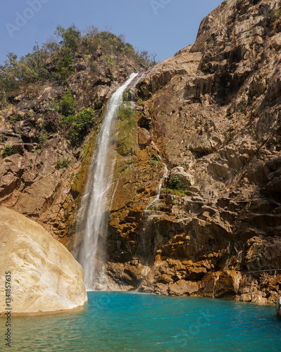 Rainbow waterfall in the mountains of Meghalaya India