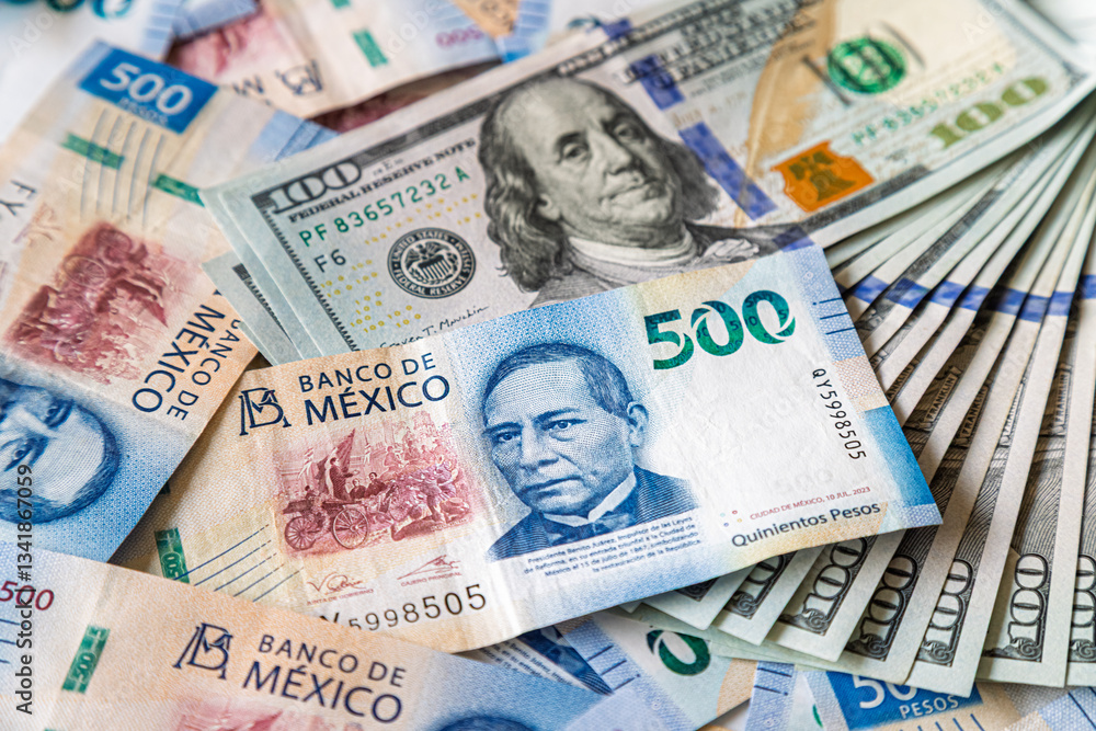 Macro close-up of 500 Mexican Pesos and 100 Dollar bills mixed up Macro close-up of 500 Mexican Pesos and 100 Dollar bills mixed up