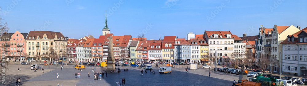 Naklejka premium Beautiful facades of historic buildings against the blue sky on a sunny day.