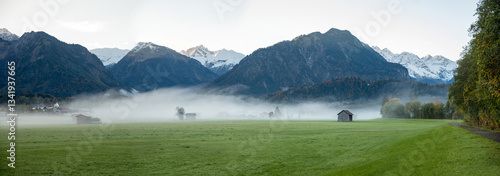 Obraz na płótnie morning landscape with some fog, tourist resort Oberstdorf, allgau alps and green meadow w salonie