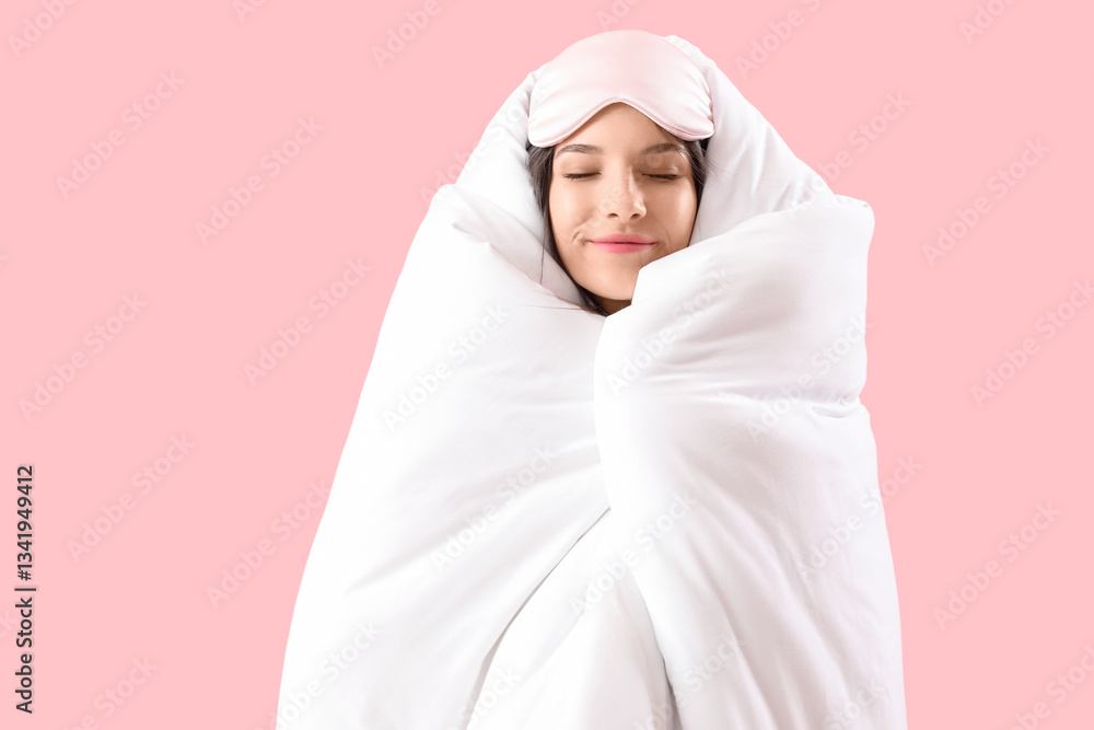Beautiful happy young woman with soft blanket sleeping on pink background Beautiful happy young woman with soft blanket sleeping on pink background