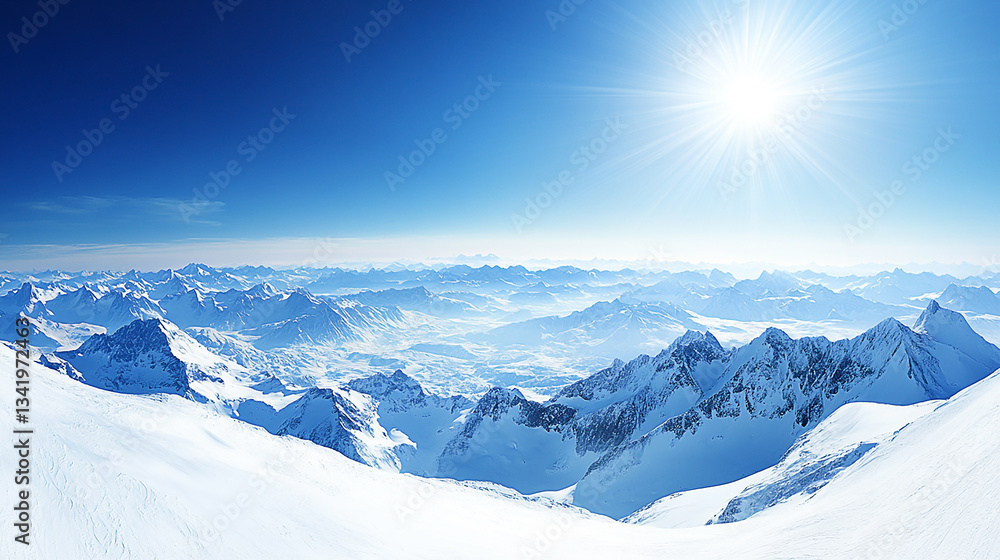 Fototapeta premium Snow-covered mountain landscape under a bright blue sky with the sun shining above