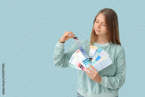 Young woman with color samp...