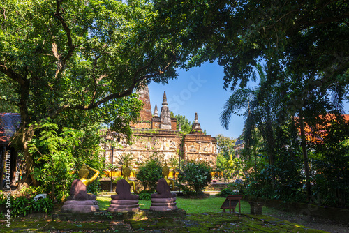 Obraz na płótnie Wat Chet Yot or Wat Photharam Maha Wihan, seven pagoda temple It is a major tourist attraction in Chiang Mai, Thailand.with evening,Temple in Chiang Mai. w salonie