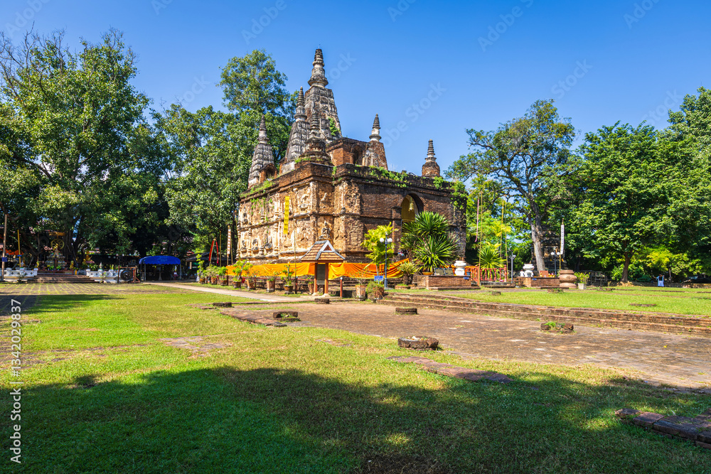 Wat Chet Yot or Wat Photharam Maha Wihan, seven pagoda temple It is a major tourist attraction in Chiang Mai, Thailand.with evening,Temple in Chiang Mai.
