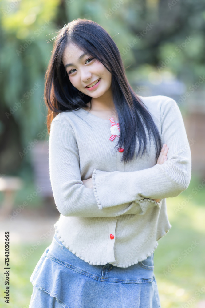 Portrait cute smiles Asian of attractive young teenage girl the cafe on vacation at a coffee shop in spring day