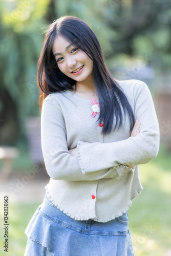 Obraz na płótnie Portrait cute smiles Asian of attractive young teenage girl the cafe on vacation at a coffee shop in spring day w salonie
