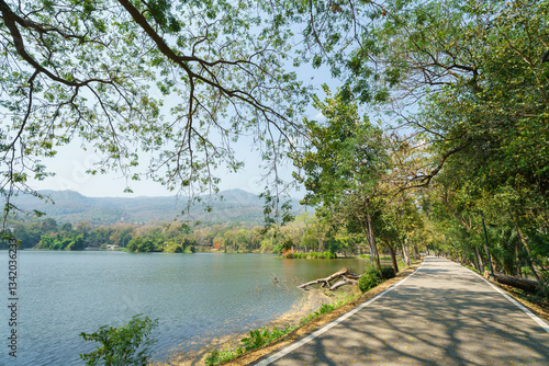 a public place leisure travel landscape lake views at Ang Kaew Chiang Mai University and Doi Suthep nature forest Mountain views spring cloudy sky background with white cloud.