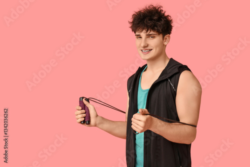 Sporty guy with jumping rop...