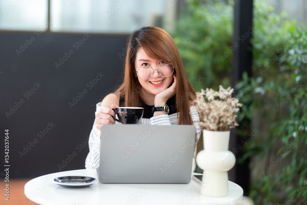 Happy of asian freelance people business female casual working with laptop computer and holding a coffee and smartphone in coffee shop like the background,communication concept