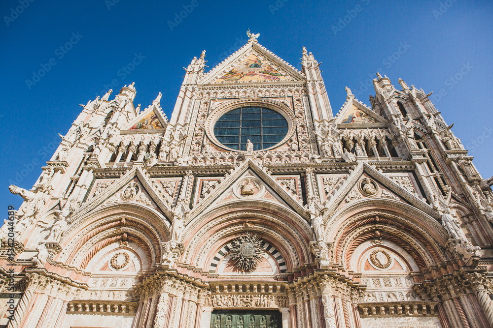 The architecture and narrow streets of the city of Siena in Italy The architecture and narrow streets of the city of Siena in Italy