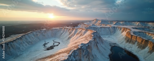 Drone topview of white mountains formed from industrial gypsum wastes in Ukraine. Chemical phosphate production pollution. Concept of eco disaster, environmental damage. Ecology problems of open pit
