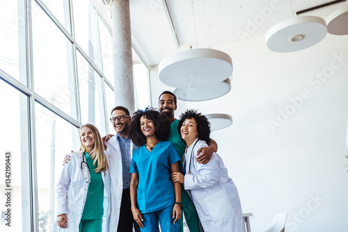 Foto Group of Happy Medical Professionals Standing Together in a Modern Bright Office