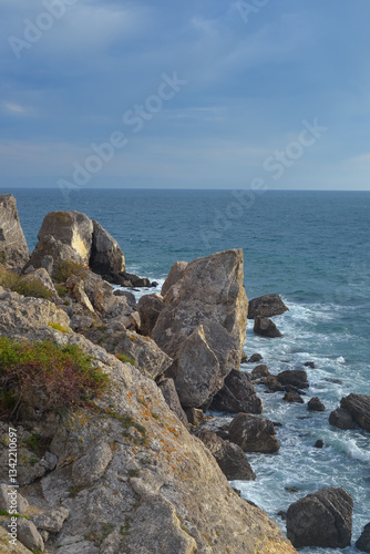 Wallpaper Mural Waves of the Black Sea crash on a rocky shore on a sunny day in Crimea. Torontodigital.ca