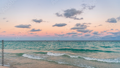 Fototapeta Naklejka Na Ścianę i Meble -  Romantic summer vacation sunrise on seascape. Sea horizon view. Cloudy sky and seascape at summer vacation. Skyscape with sea horizon. Calm horizon view at sea sunrise. Horizon line