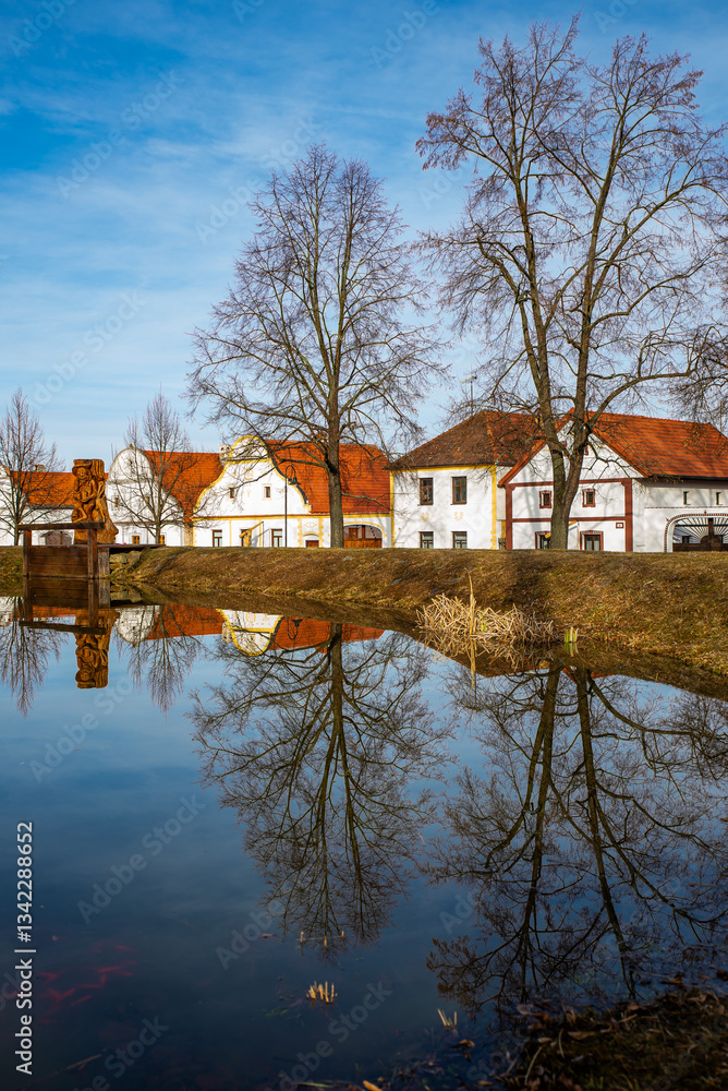 Fototapeta premium Holasovice, Czech republic - March 04, 2025. Traditional south bohemian village with typical architecture