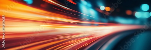 A blurry image of a lighted road with a bright orange line