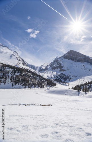 Wallpaper Mural People walking across winter mountain landscape on a sunny day Torontodigital.ca