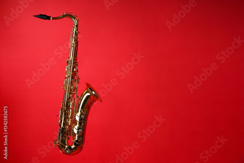 Wallpaper Mural Jazz. One beautiful saxophone on red background, space for text Torontodigital.ca