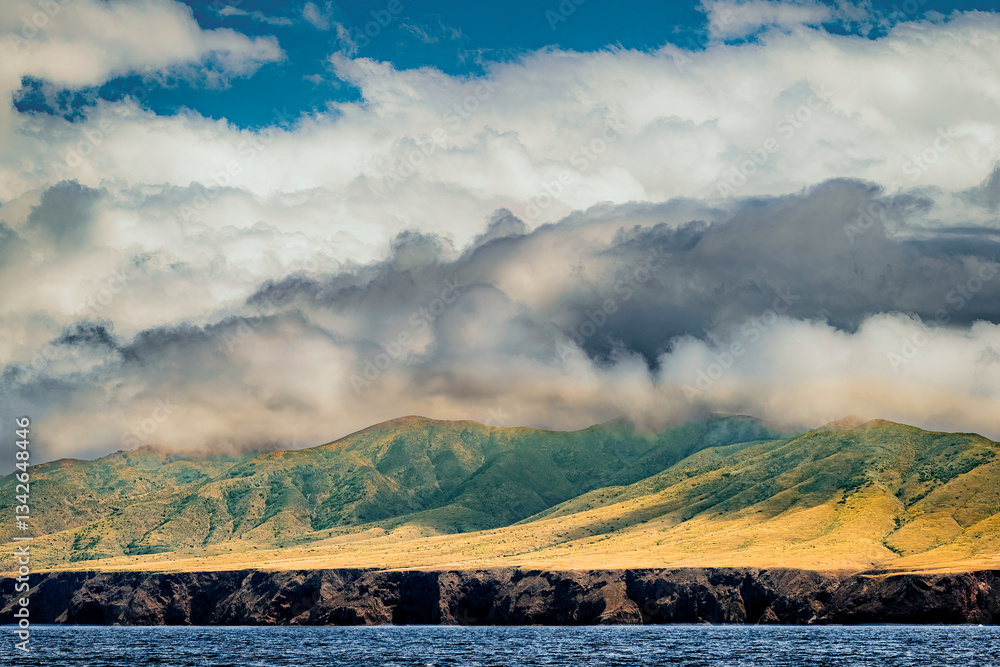Striking dramatic skies hang over the coastal shores of the Channel Islands during a colorful Springtime day