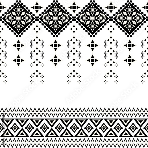 Geometric Native American ethnic seamless pattern in black and white. Tribal vector background. Aztec ornament. Navajo pattern. Vector texture for wallpaper, elaborate borders, textiles, and carpets.