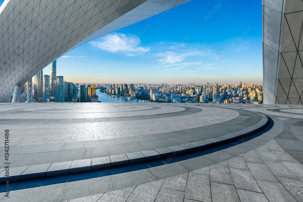 Empty square platform and cityscape at sunrise in Shanghai