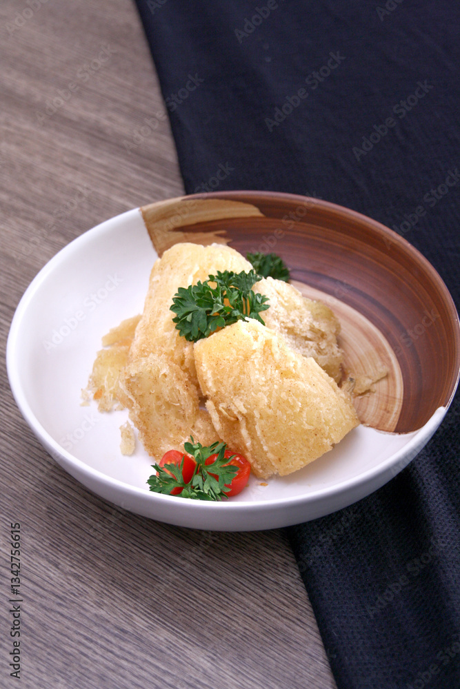 a plate of indonesian snack fried cassava a plate of indonesian snack fried cassava