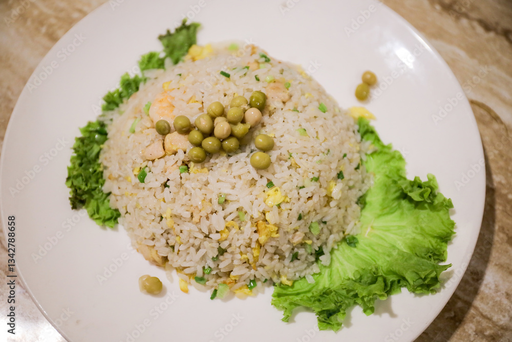 Chinese Food Special Yangchow Fried Rice barbecue pork, shrimp or prawn, onions and peas are added to fried rice cooked with egg Chinese Food Special Yangchow Fried Rice barbecue pork, shrimp or prawn, onions and peas are added to fried rice cooked with egg