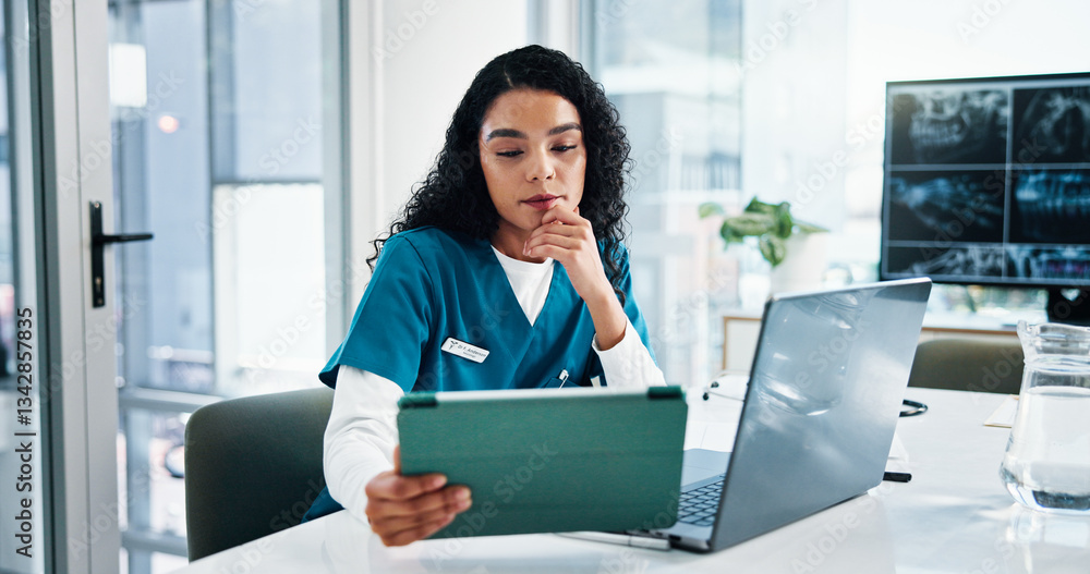 Woman, nurse or research with tablet on laptop for medical discovery, study or reading at hospital. Female person, healthcare worker or employee with technology for telehealth or health app at clinic