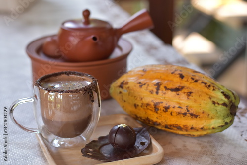 Cup of cacao husk tea from the roastet outer shells of the cacao bean, Cup of cacao husk tea, chocolate and cocoa powder on a dark, Cup of hot chocolate photo