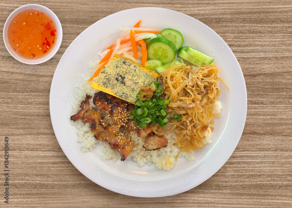 Vietnamese combination broken rice. Cơm Tấm Sườn Bì Chả. Vietnamese Broken Rice is served with grilled pork. Com tam suon bi cha. Broken rice with grilled pork chop, meatloaf and shredded pork skin. Vietnamese combination broken rice. Cơm Tấm Sườn Bì Chả. Vietnamese Broken Rice is served with grilled pork. Com tam suon bi cha. Broken rice with grilled pork chop, meatloaf and shredded pork skin.
