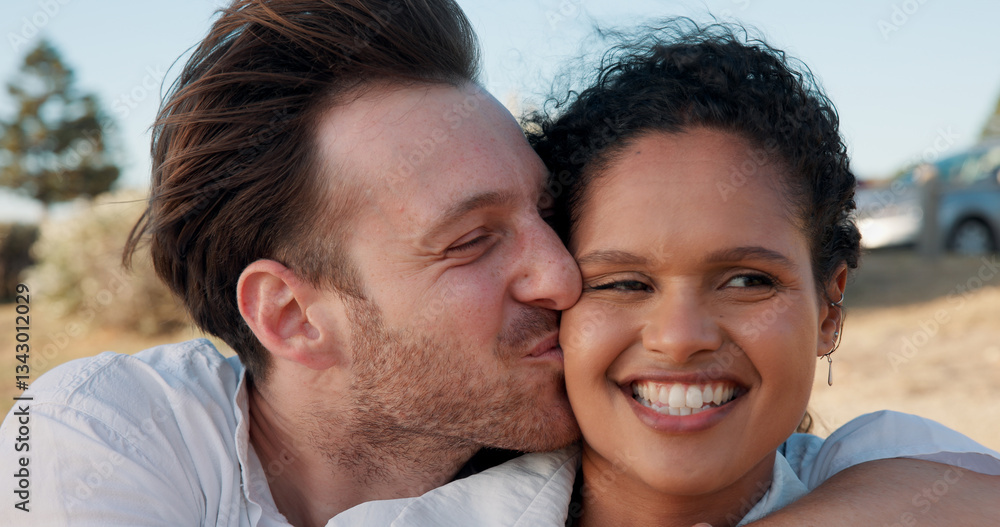 Fototapeta premium Kiss, love and smile with couple at beach for travel vacation, bonding and romantic date. Happiness, summer holiday and marriage anniversary with man and woman outdoors for relax, adventure and hug