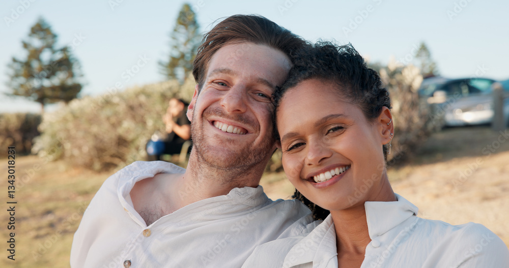 Fototapeta premium Love, interracial couple and smile in portrait outdoor for romantic date, relationship support and weekend break. Happy, people and relax in nature for travel holiday, trust or commitment in marriage