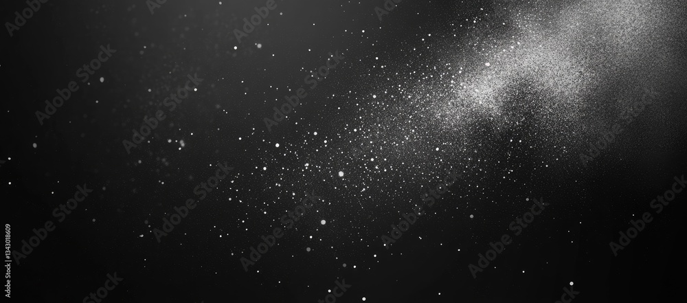 Fototapeta premium Abstract black and white background with scattered particles.