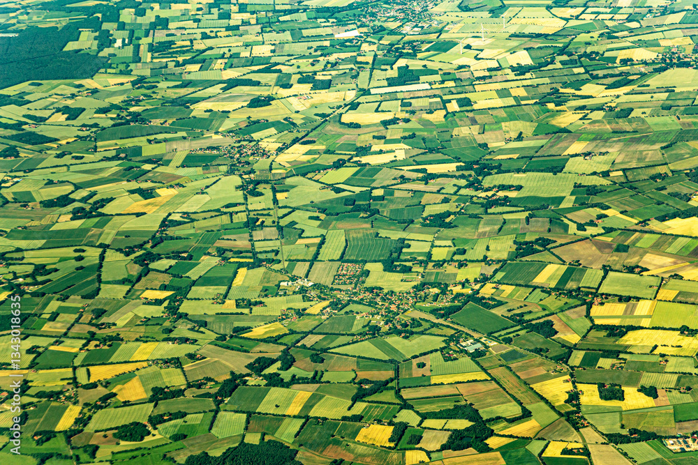 Fototapeta premium Aerial view of settlemens and fields, Germany, Europe.